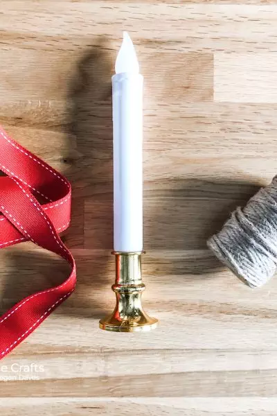 Use inexpensive dollar store candles and some leftover craft stash for an instant upgrade!