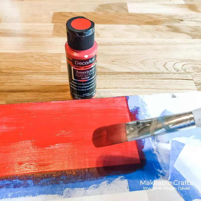 move your painters tape and apply your red paint