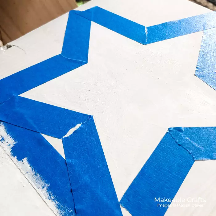 use painters tape around the edges of your star