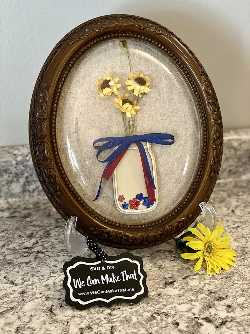 A small handful of recycled crafts supplies and a dollar store frame make this sweet little scene - see how you can make your own!