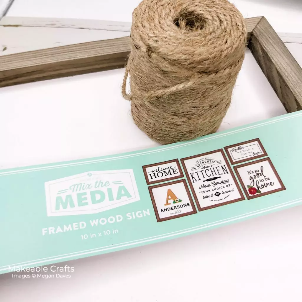 Thick twine and a basic wood sign about to be turned into an adorable piece of DIY fall home decor