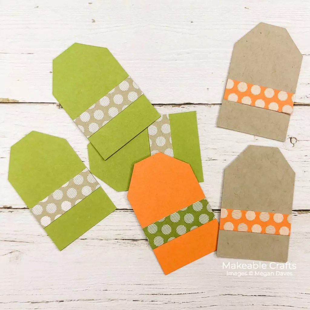 Colorful paper tags to be used as letter backgrounds for a quick and easy piece of DIY fall home decor
